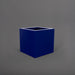 Montroy Cube Fiberglass Planter in matte cobalt blue against gray background.