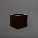 Montroy Cube Fiberglass Planter in matte dark brown against gray background.