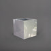 Montroy Cube Fiberglass Planter in  metallic silver against gray background.
