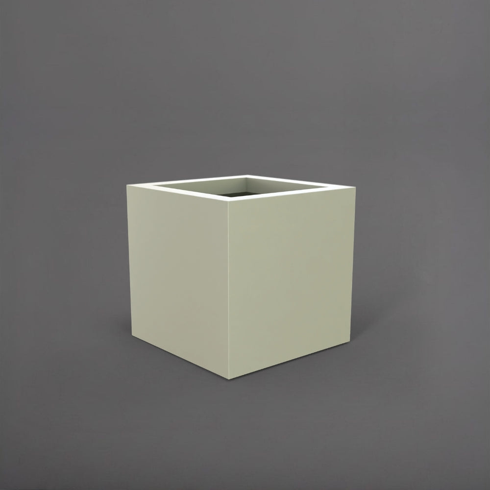 Montroy Cube Fiberglass Planter in satin beige against gray background.
