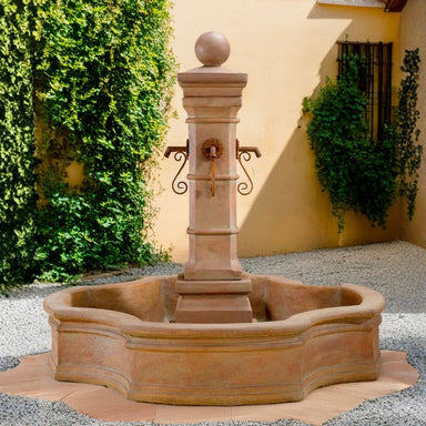 Avignon Monaco Pond Fountain on concrete surrounded with gravel.