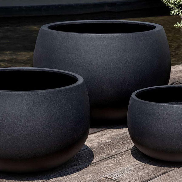 Norfolk Planter, Large in onyx black lite in the backyard