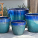 Ocho Planter - Running Blue - S/4 on concrete in the backyard