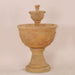 Oliva Two Tier Fountain against brown background.