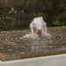 Onda Square on concrete wall background upclose in water