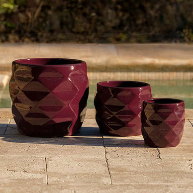 Origami Planter - Plum - S/3 on concrete in the pool