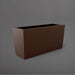Panama Tapered Rectangle Planter in matte dark brown against gray background.
