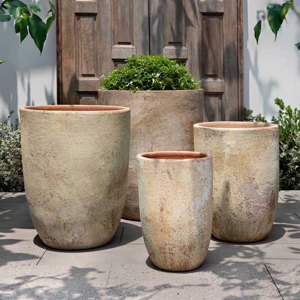 Pantelleria Planter - Vicolo Muro - S/4 filled with plants in the backyard