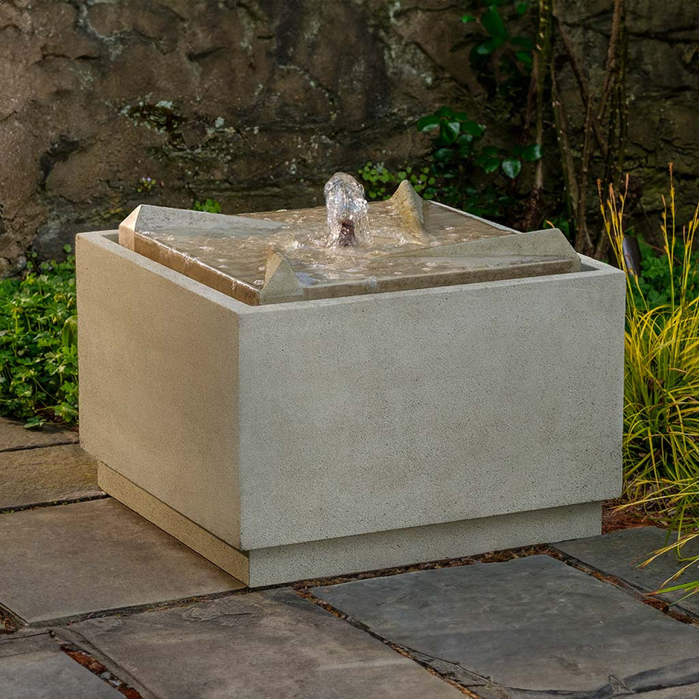 Parallax Fountain on concrete with wall background
