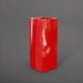 Perth Tall Corner Fiberglass Planter in gloss red against gray background.