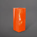 Perth Tall Corner Fiberglass Planter in gloss tangerine against gray background.