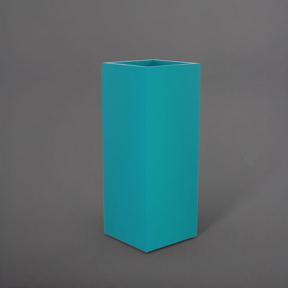 Perth Tall Corner Fiberglass Planter in satin seafoam green against gray background.