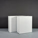 Perth Tall Rectangle Fiberglass Planter on concrete shown with different sizes.