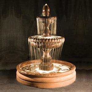 Pioggia Fountain with 46 inch basin running against black background