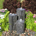 Polished Corner Triple Granite Fountain Kit on mixed pebbles in action