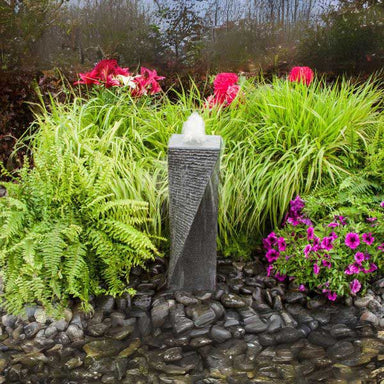 Polished Twist 24 Granite Fountain Kit on black pebble in action