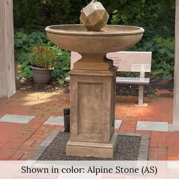 Polyhedron Fountain on gravel against concrete bench upclose