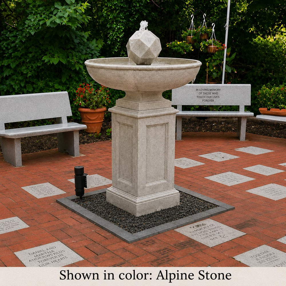 Polyhedron Fountain on gravel near concrete bench