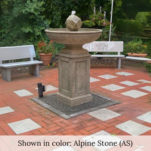 Polyhedron Fountain on gravel near concrete bench