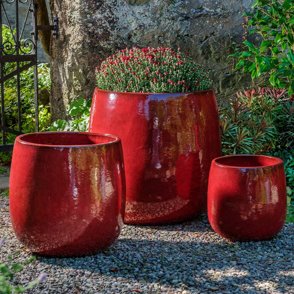 Potrero Planter - Tropic Red - S/3 on gravel filled with plants