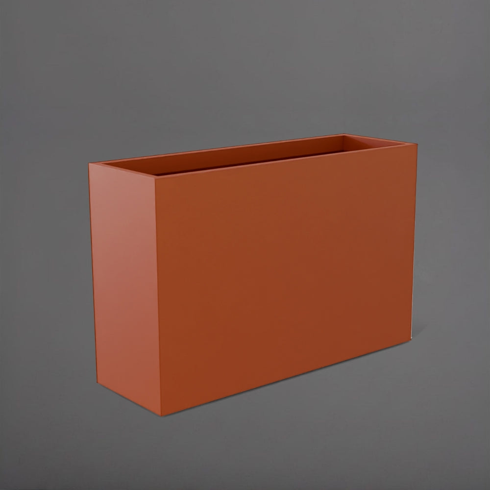 Potsdam Rectangle Fiberglass Planter in matte terra cotta against gray background.