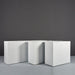 Potsdam Rectangle Fiberglass Planter on concrete shown with different sizes.