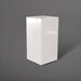 Potsdam Tall Corner Fiberglass Planter in gloss bright white against gray background.