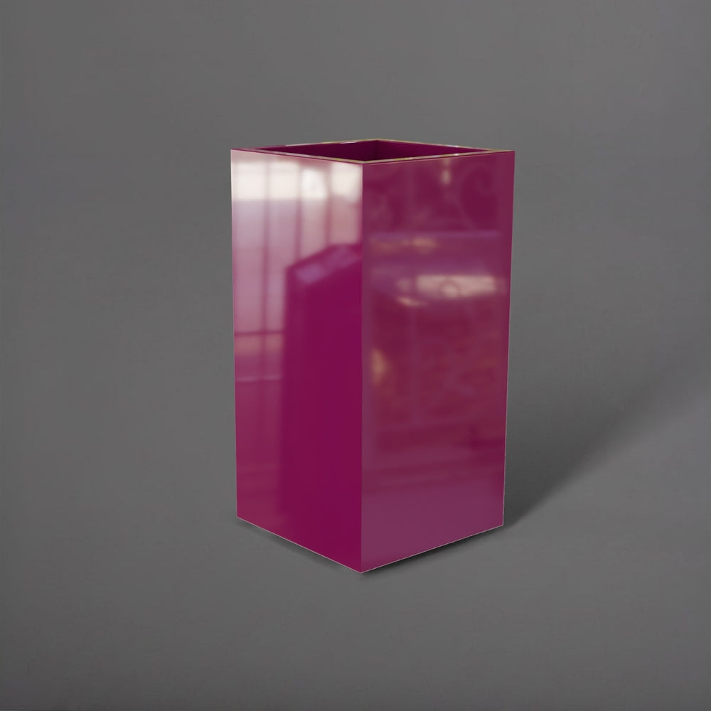 Potsdam Tall Corner Fiberglass Planter in gloss eggplant against gray background.