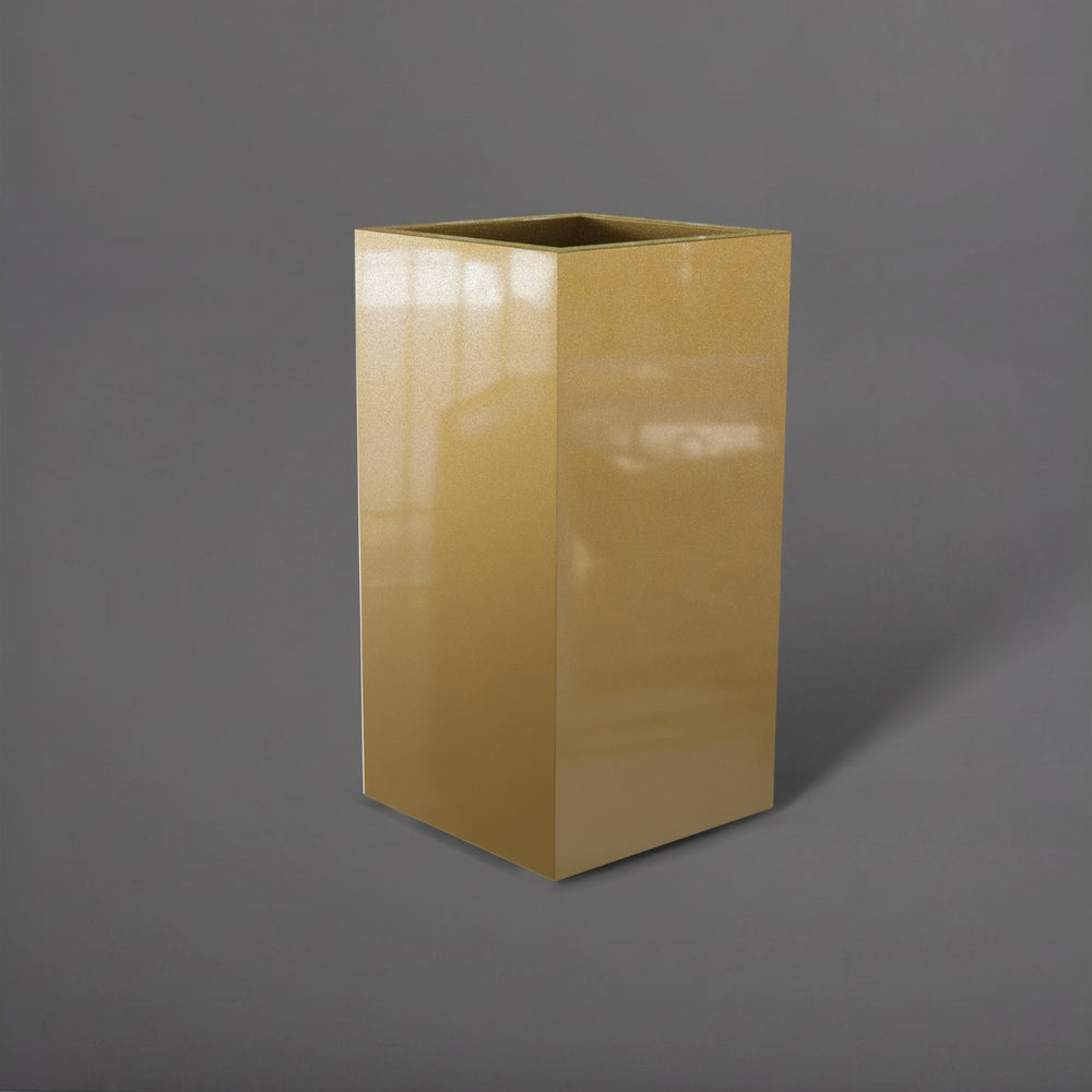 Potsdam Tall Corner Fiberglass Planter in gloss metallic gold against gray background.