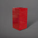 Potsdam Tall Corner Fiberglass Planter in gloss red against gray background.