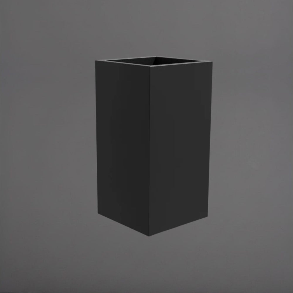 Potsdam Tall Corner Fiberglass Planter in matte charcoal against gray background.