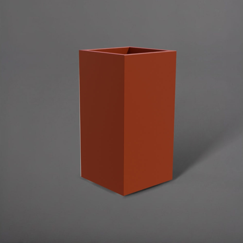 Potsdam Tall Corner Fiberglass Planter in matte terra cotta against gray background.