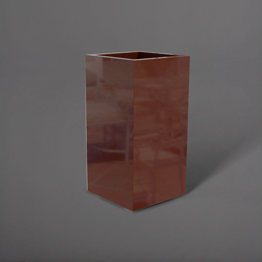 Potsdam Tall Corner Fiberglass Planter in metallic bronze against gray background.