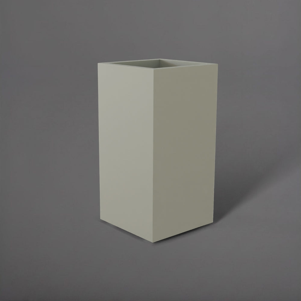 Potsdam Tall Corner Fiberglass Planter in satin beige against gray background.