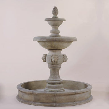 Quatro Lion Two Tier Pond Fountain against gray background.