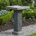 Reef Point Birdbath on gravel in the backyard