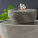 Ribbed Longport Fountain running on the table upclose.