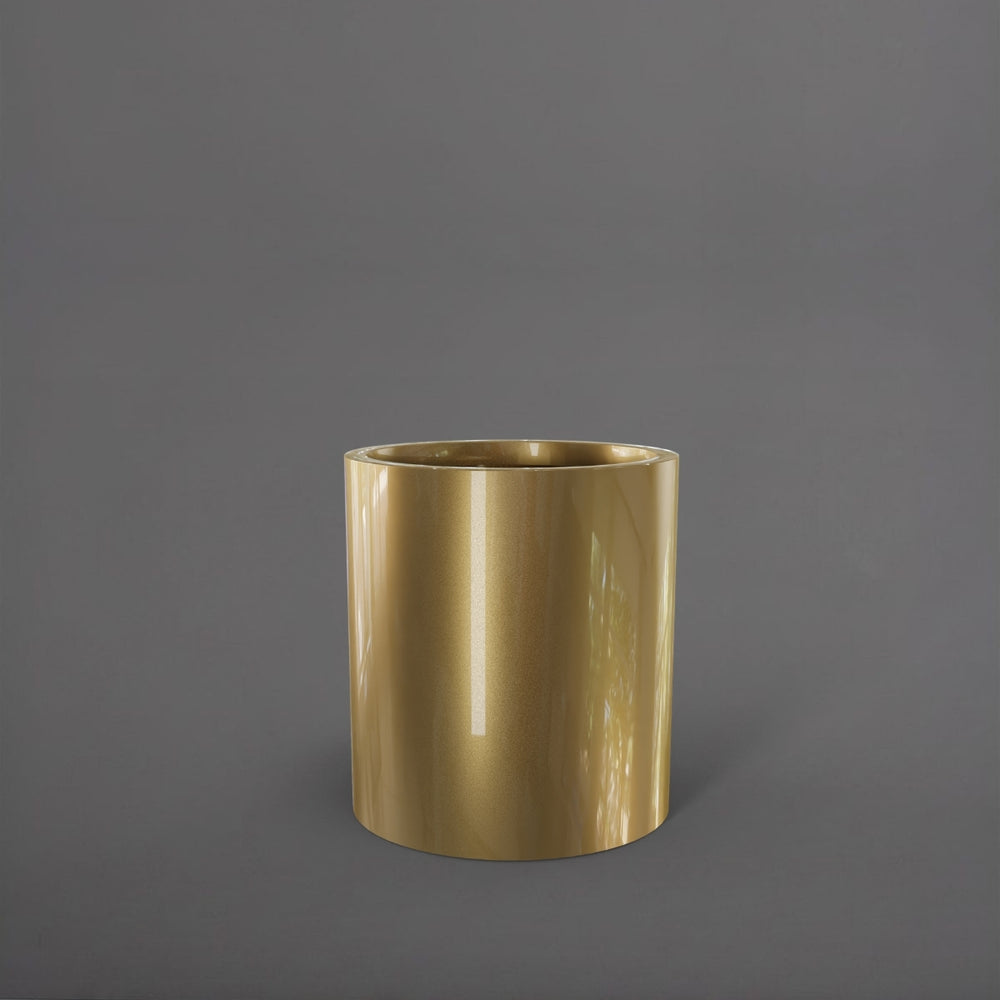 Rio Grande Cylinder Fiberglass Planter in gloss metallic gold against gray background.
