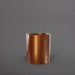 Rio Grande Cylinder Fiberglass Planter in metallic bronze against gray background.