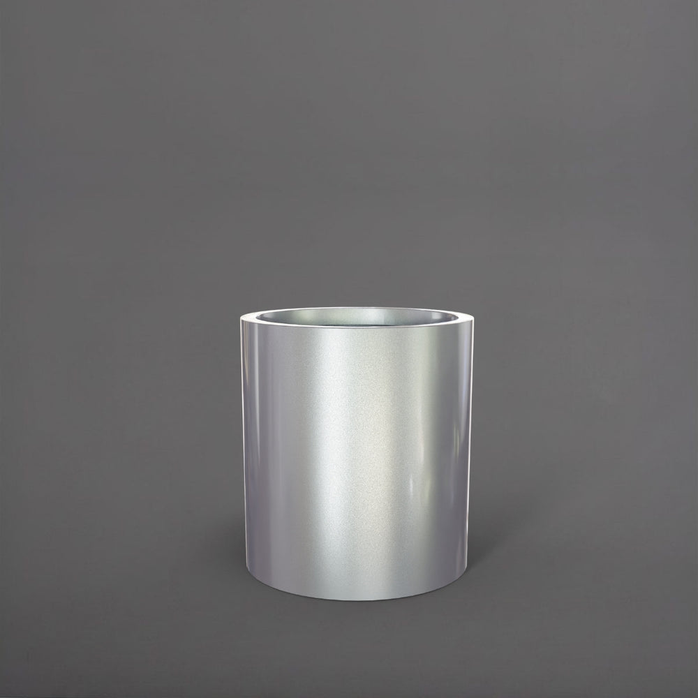 Rio Grande Cylinder Fiberglass Planter in metallic silver against gray background.