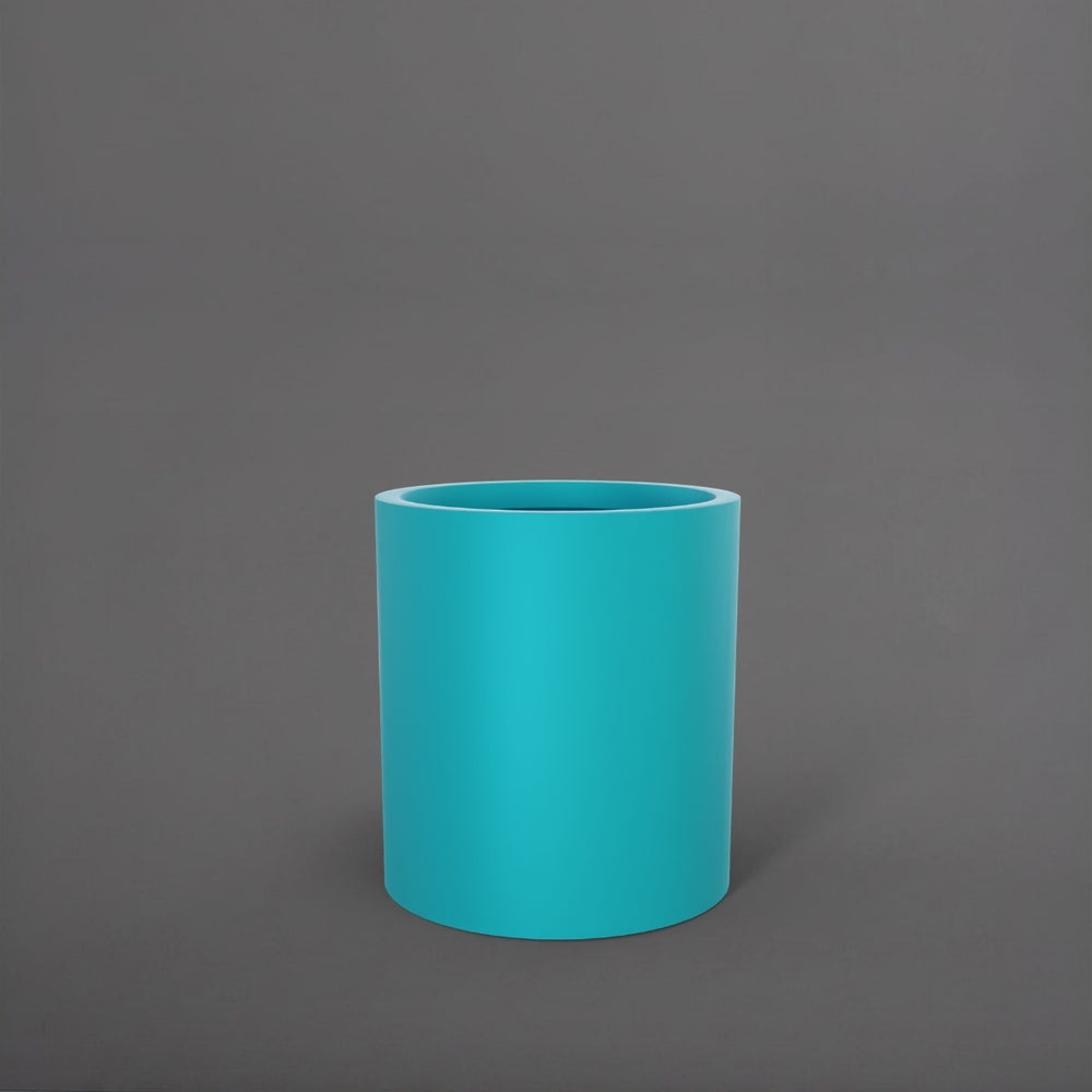 Rio Grande Cylinder Fiberglass Planter in satin seafoam green against gray background.