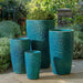 Rivulet Planter - Blue Jade - S/4 on concrete in the backyard