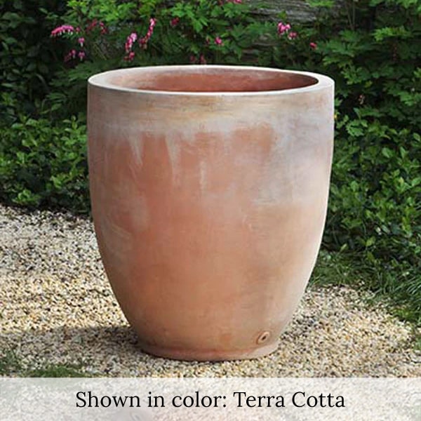 Rovigo Planter Terra Cotta S/1 on gravel in the backyard