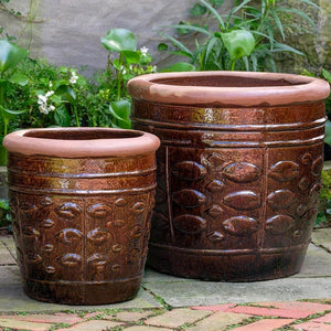 Rustic Leaf Pot - Rustic Brown - Set of 2 on concrete in the backyard