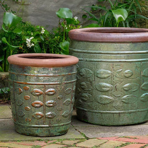 Rustic Leaf Pot - Rustic Green - Set of 2 on concrete in the backyard