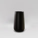 Saigon Tapered Round Fiberglass Planter in matte black against gray background.