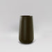 Saigon Tapered Round Fiberglass Planter in matte bronze against gray background.