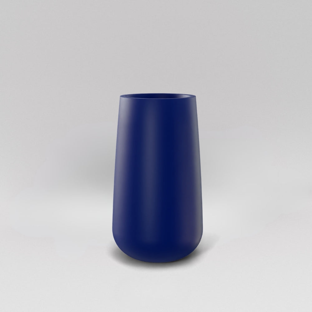 Saigon Tapered Round Fiberglass Planter in matte cobalt blue against gray background.