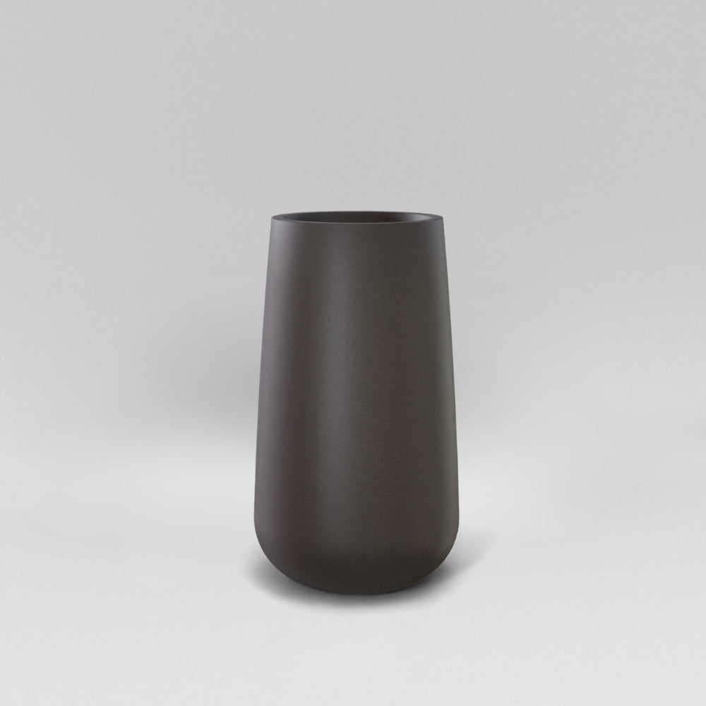 Saigon Tapered Round Fiberglass Planter in matte gunmetal against gray background.