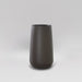 Saigon Tapered Round Fiberglass Planter in matte gunmetal against gray background.